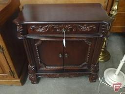 Cabinet with drawer and storage; top has damage in one corner, 30"h x 29"w x 16"d