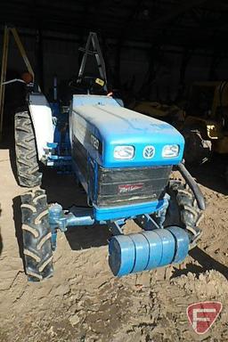 New Holland 1720 compact utility tractor with FWA, ROPS, 5 suitcase weights, 3293 hours