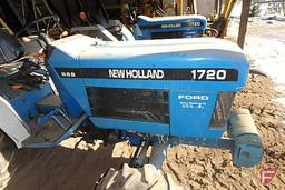 New Holland 1720 SSS compact utility tractor with FWA, ROPS, 5 suitcase weights, 2109 hours