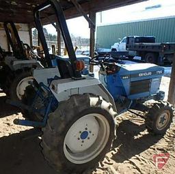 New Holland 1720 SSS compact utility tractor with FWA, ROPS, 5 suitcase weights, 2109 hours