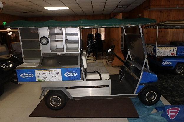 Club Car Carryall gas utility vehicle with beverage merchandiser bed and canopy