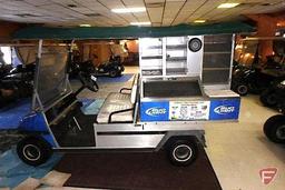 Club Car Carryall gas utility vehicle with beverage merchandiser bed and canopy