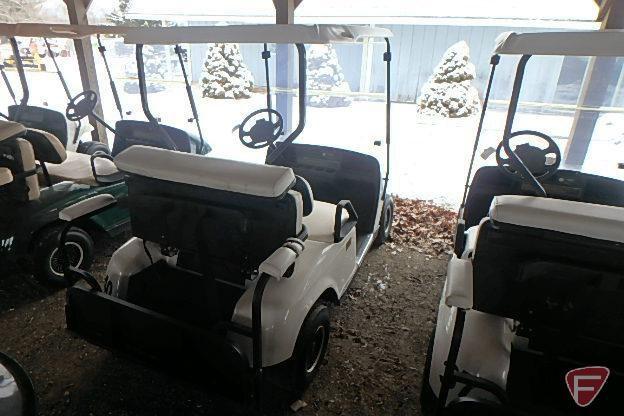 EZ-GO TXT 4-seater gas golf car with fold-down rear seat,