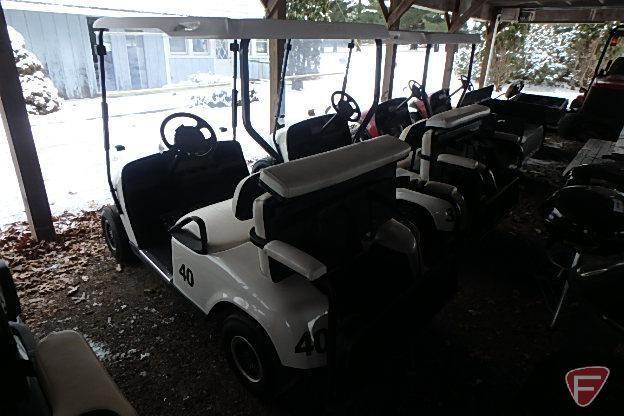 EZ-GO TXT 4-seater gas golf car with fold-down rear seat,