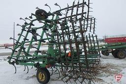 John Deere 980 32 1/2 ft. pull type wing field cultivator with 5 bar spike tooth finisher