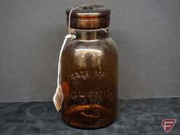 Canning/fruit jar, amber, Trade Mark Lightning, bottom marked Putnam 130,