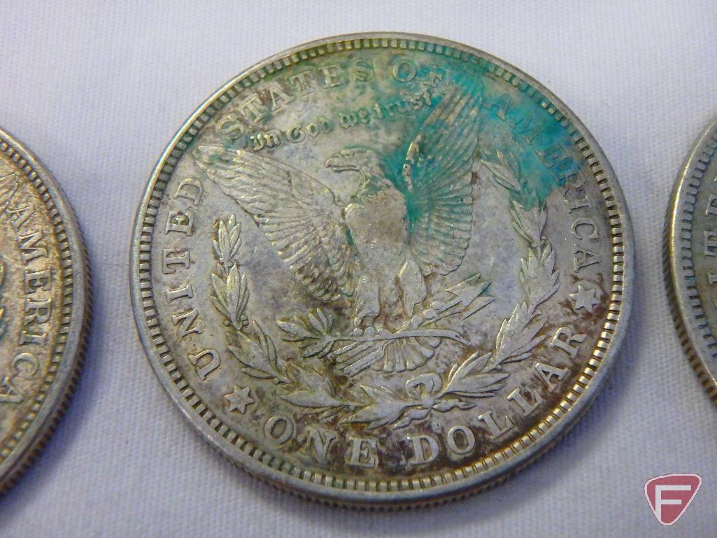 (8) 1921 PD or S Morgan silver dollars, all have varying amounts of PVC