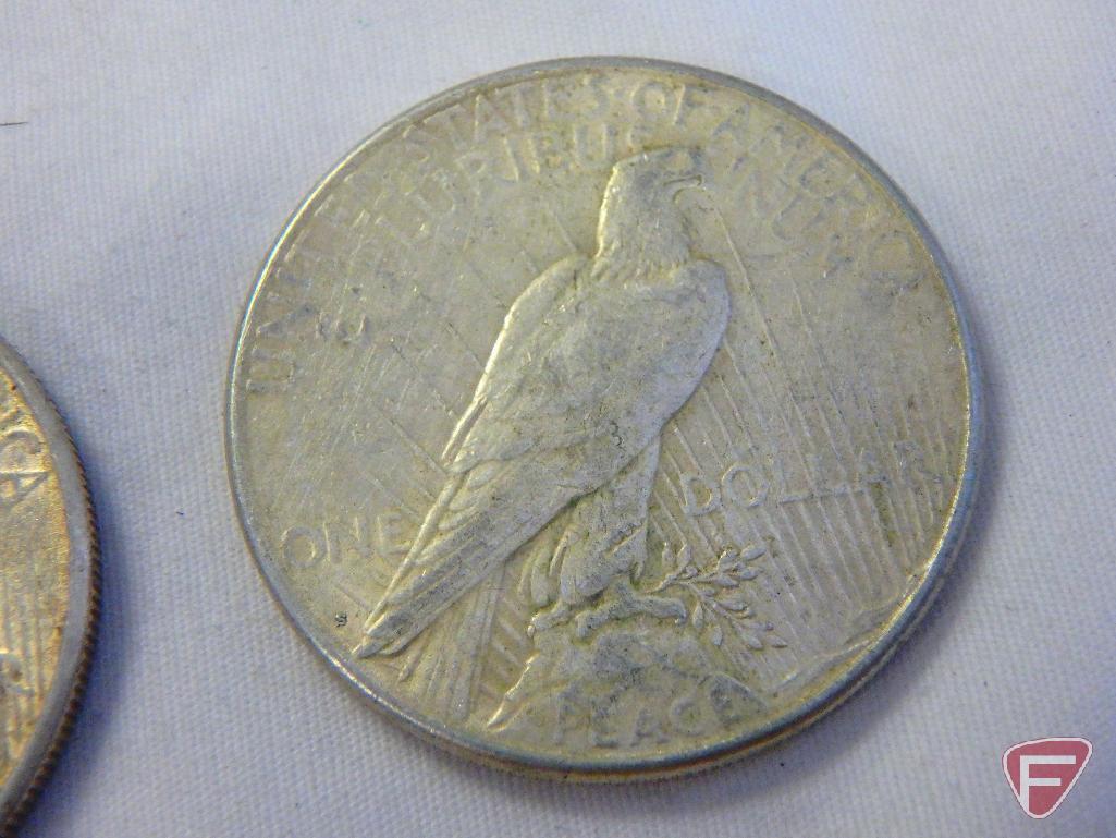 (4) Circulated 1922/23 Peace silver dollars