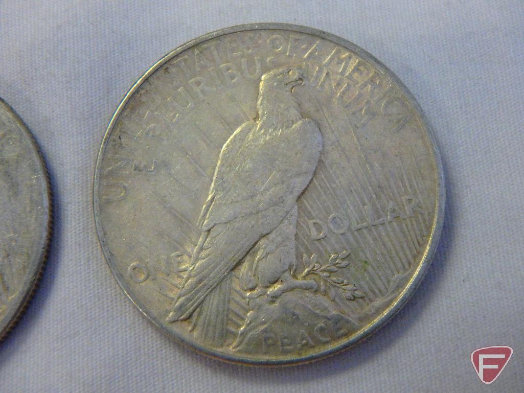 (4) 1922 Peace silver dollars, avg. circulated condition