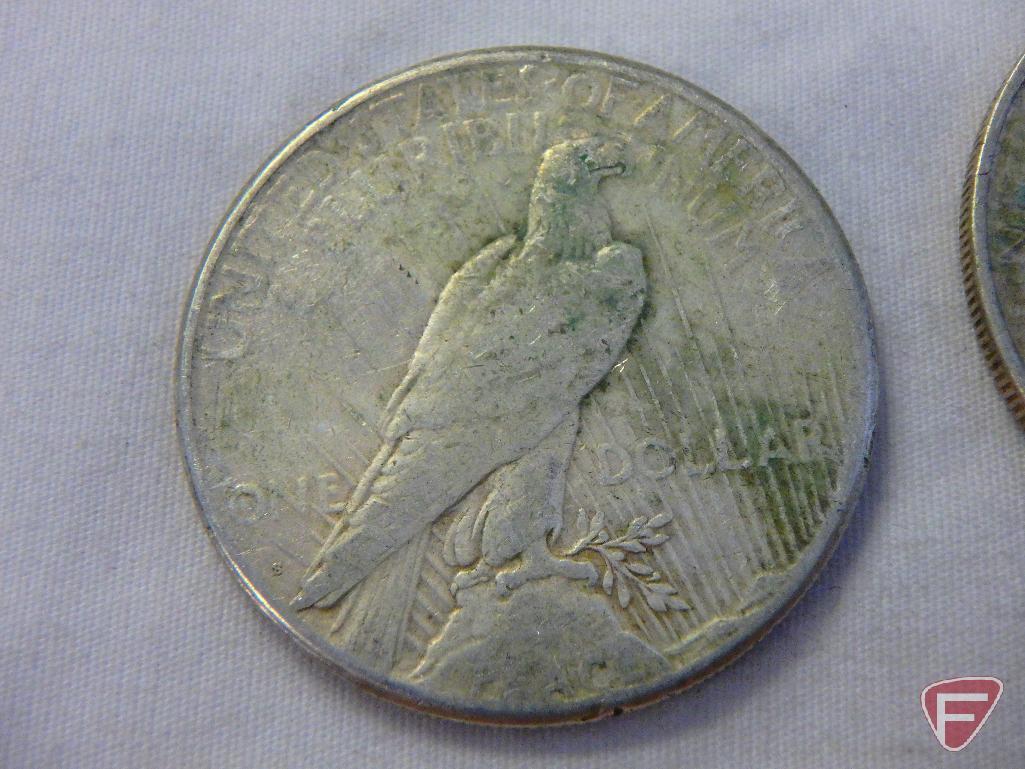 (4) 1922 Peace silver dollars, avg. circulated condition