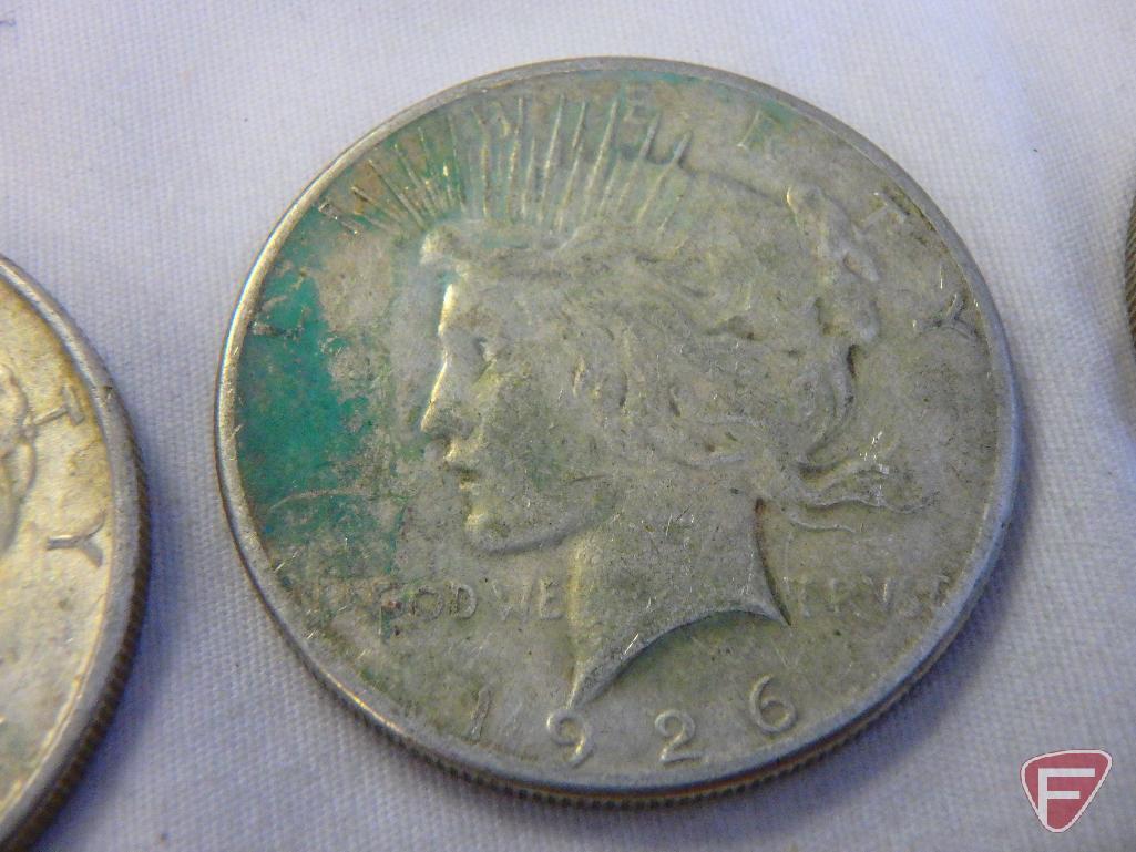 (2) 1925 Peace silver dollars, AU to uncirculated, (1) 1926 S Peace silver dollar