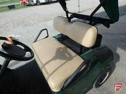 EZ-GO TXT electric golf car, green, has windshield, canopy, rain curtain, SN: 2211596