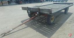 Case running gear with implement tires, with wood hay rack, 8.5 ft. x 16.5 ft.