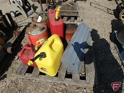 (2) Farm-Oyl metal motor oil advertising cans, (2) aluminum sawhorses, (3) fuel cans,