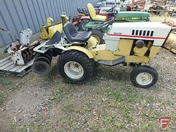 Sears Suburban riding garden tractor with 48in cultivator attachment, 35in snowblower, plow,