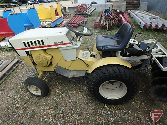 Sears Suburban riding garden tractor with 48in cultivator attachment, 35in snowblower, plow,