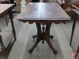 Wood occasional table with pedestal, on wheels, 28inHx30inWx21D