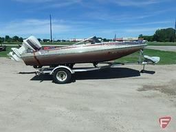 1982 Baja 160BR speedboat with 115HP Johnson outboard, ski pole, and 1982 EZ Loader trailer