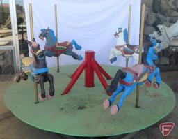 (4) horse merry-go-round, 97in round wood platform on metal base, poles are 48inH from base