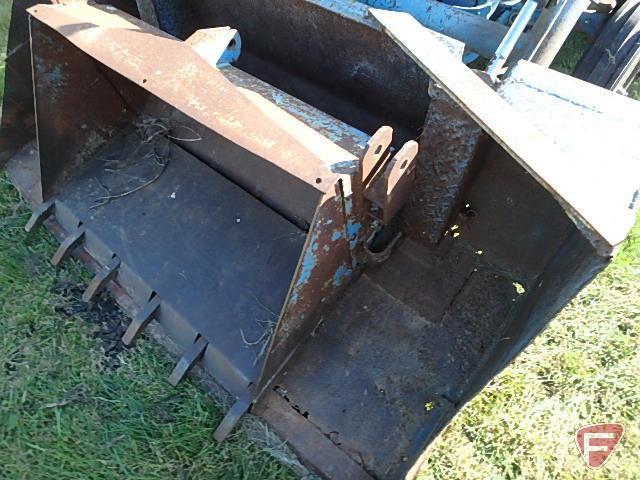 Ford 800 tractor with front hydraulic loader, 70 in W smooth bucket and 40 in bucket with teeth