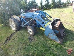 Ford 800 tractor with front hydraulic loader, 70 in W smooth bucket and 40 in bucket with teeth