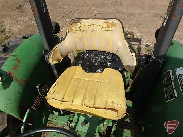 John Deere 2155 MFWD 7860 hours showing, folding ROPS, newer 16.9-28 rear rubber