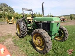 John Deere 2155 MFWD 7860 hours showing, folding ROPS, newer 16.9-28 rear rubber