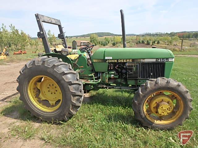 John Deere 2155 MFWD 7860 hours showing, folding ROPS, newer 16.9-28 rear rubber