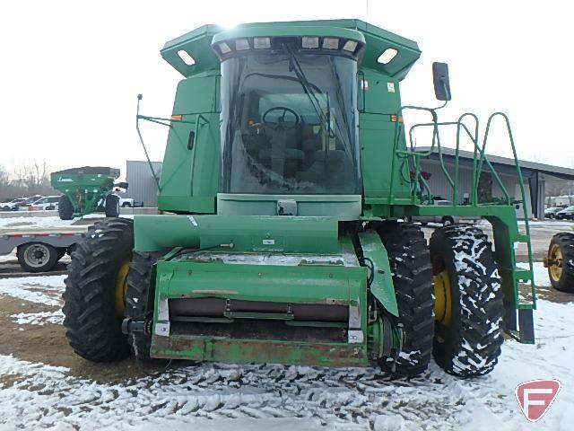 1992 John Deere 9600 combine with flared tank extension, 520/85R42 rubber and duals, 14.9x24 rears