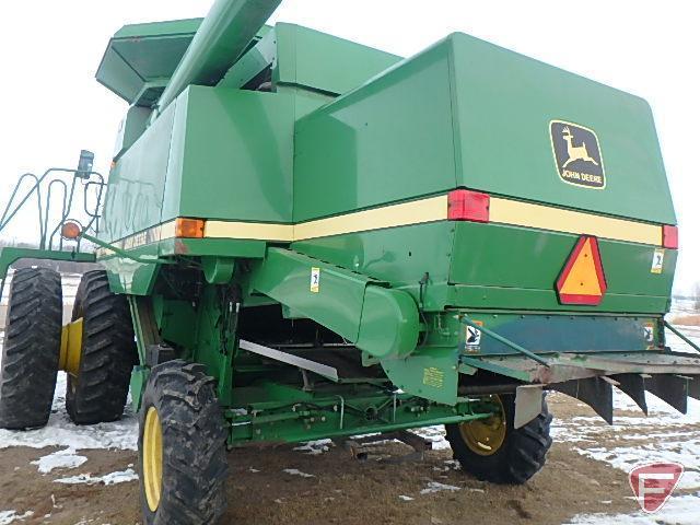 1992 John Deere 9600 combine with flared tank extension, 520/85R42 rubber and duals, 14.9x24 rears