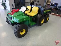 2012 John Deere TH 6x4 Gator utility vehicle with power dump box, 164 hrs showing, new battery