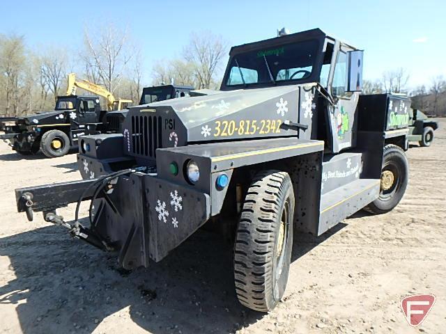 Aircraft Towing Tractor/Tug modified to plow snow