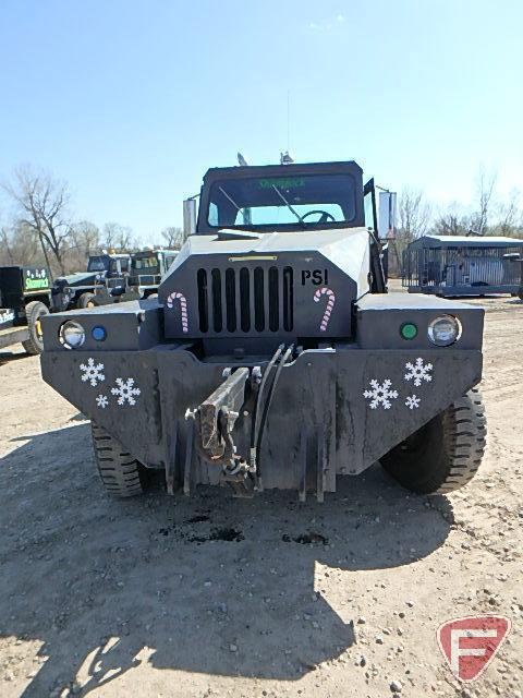 Aircraft Towing Tractor/Tug modified to plow snow