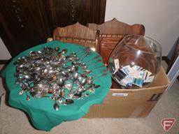 Collector spoons and wood wall display racks, matchbooks, and centerpiece bowl.