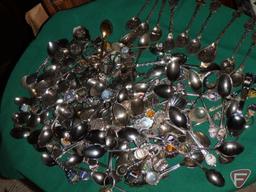 Collector spoons and wood wall display racks, matchbooks, and centerpiece bowl.