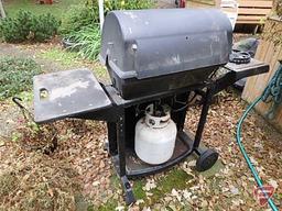 Sunbeam Grill Master propane grill with side burner and utensils. Needs cleaning.