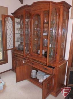 Wood and glass china cabinet, lighted, 6 adjustable glass shelves, 2 drawers, and 4 doors,