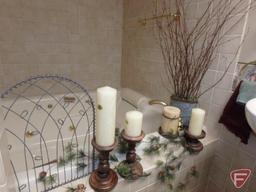 Bathroom rugs, wicker stool, metal tissue cover, soap dispenser, and cup holder, candles,