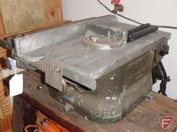 Shopmaster table saw mounted on wood bench, and American IMC Powr Profile air compressor,