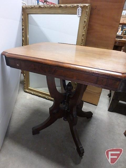 Wood parlor table and 30inx42in framed wall mirror. Both.