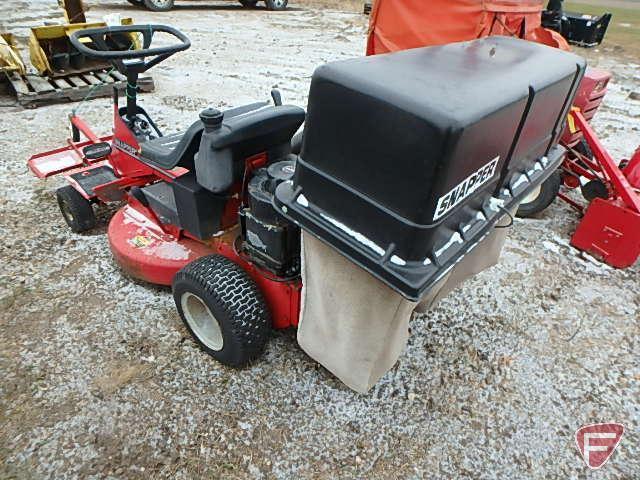 Snapper 10 HP 28" rear engine rider with collection system and thatcher