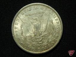 1885 O Morgan Silver Dollar with pretty reverse toning AU