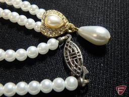 Ladies 16" natural cultured 6mm pearls with yellow GF clasp, knotted