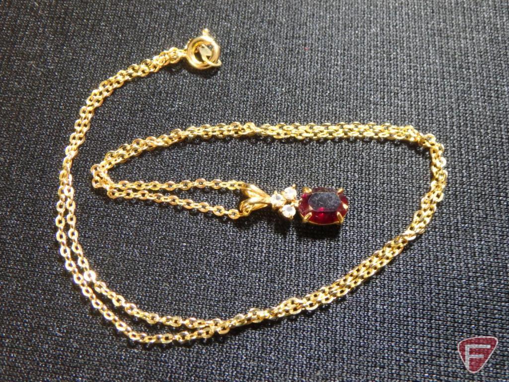 Ladies yellow GF garnet pendant with (3) round CZ stones on 18" chain