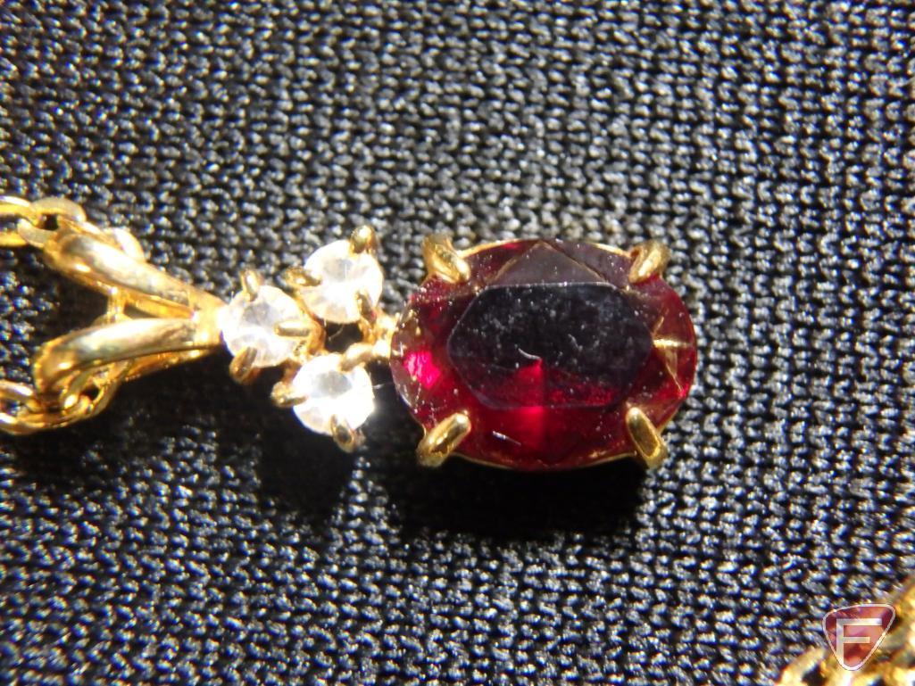 Ladies yellow GF garnet pendant with (3) round CZ stones on 18" chain