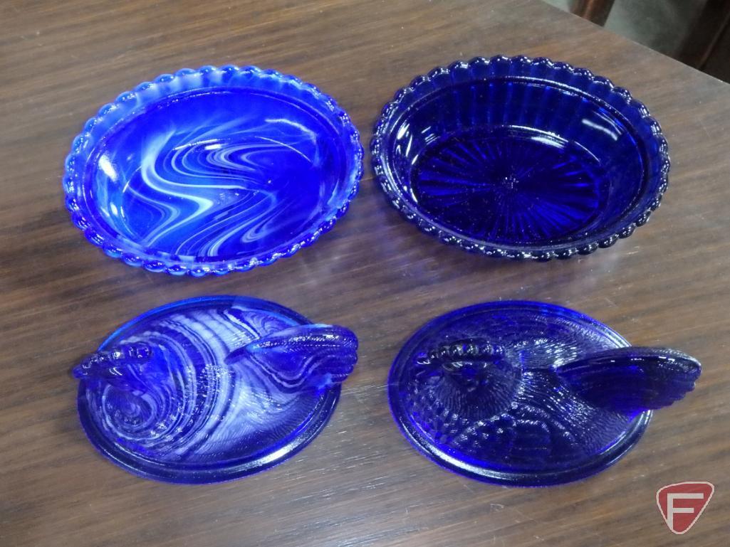Glass covered chicken dishes, blue, blue/white swirl, and amber, metal wall decoration, ceramic