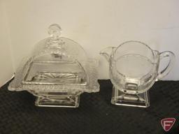 Vintage glass covered butter dish with matching pitcher, both