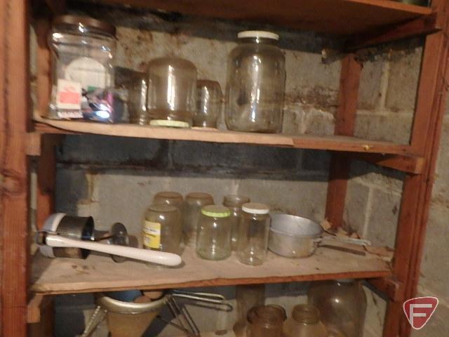 Canning jars, tomato squisher, plastic pails, lids, and rings
