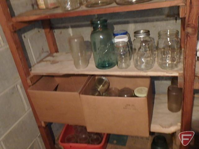 Canning jars, tomato squisher, plastic pails, lids, and rings