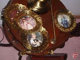 Round occasional table, lamp, small curio, and wood shelves